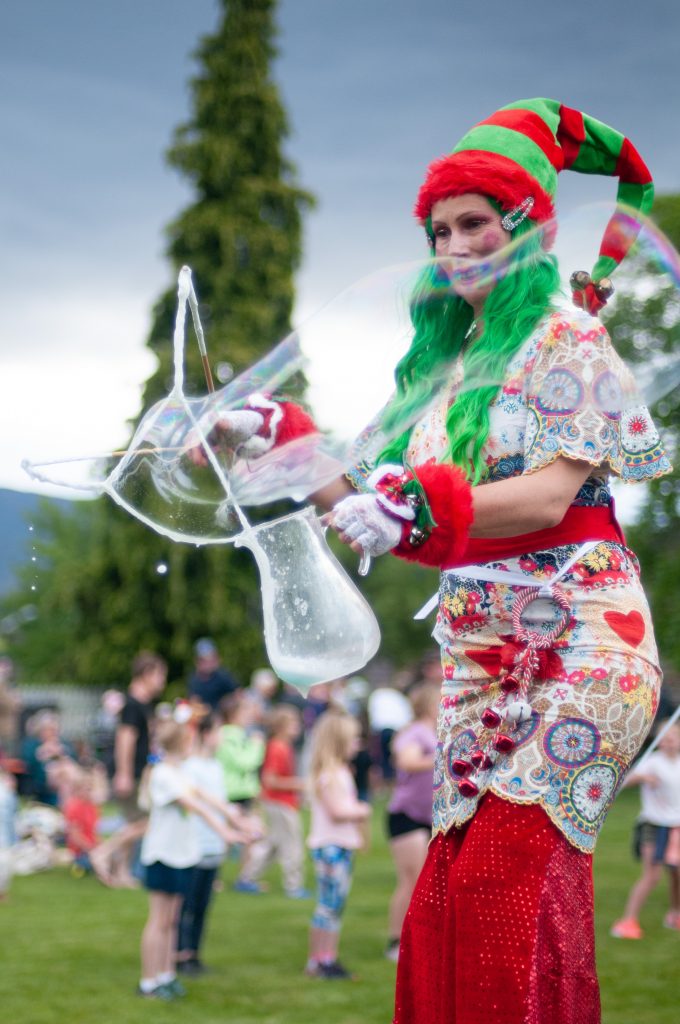Bubbles of fun . . . Milly B, of Flame Entertainment, creates bubbles at the annual Christmas celebration in Cromwell.  PHOTO: SHANNON THOMSON